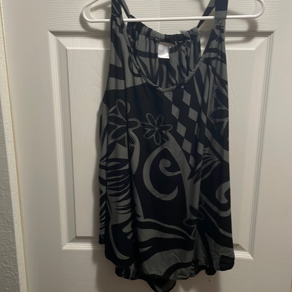 Hawaiian adjustable tank top. V neck, flowy, rounded bottom